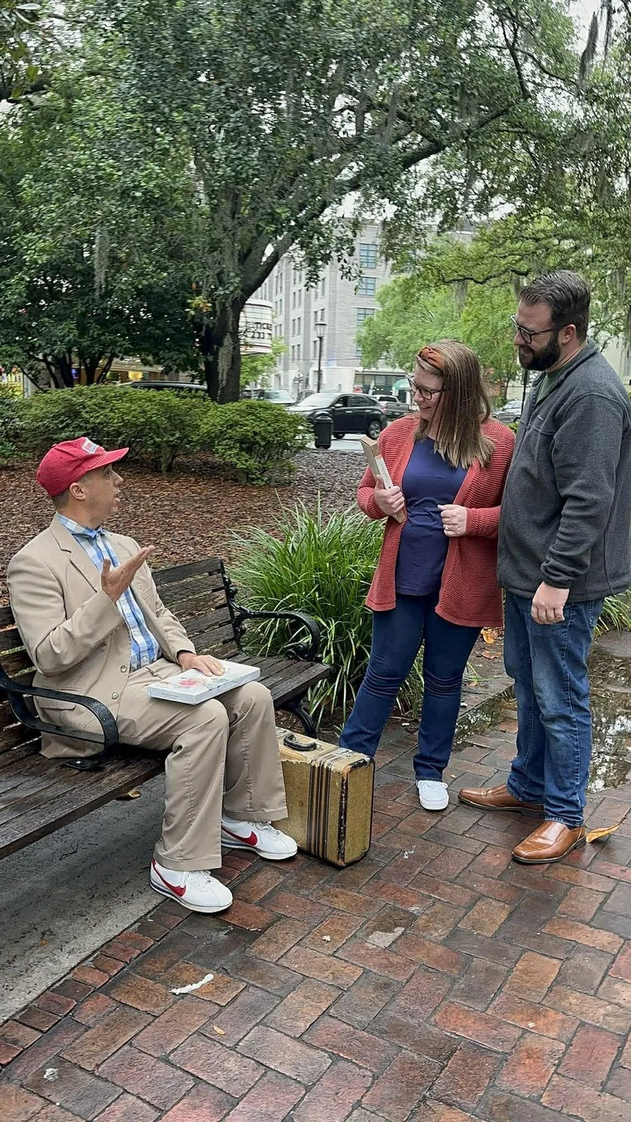 Get Gumped performer talking with guests in a Savannah square