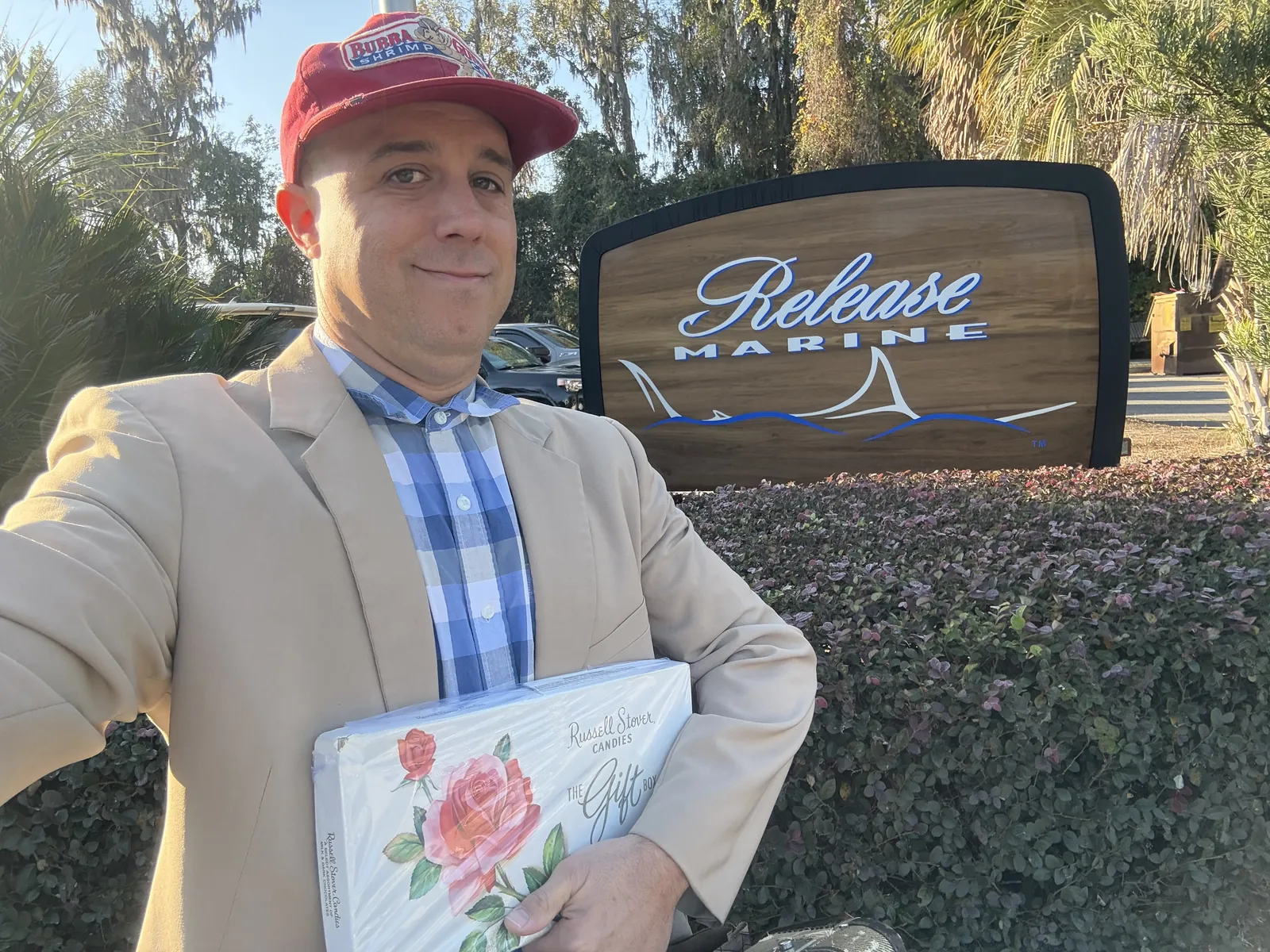 Get Gumped performer holding a rose at an appearance