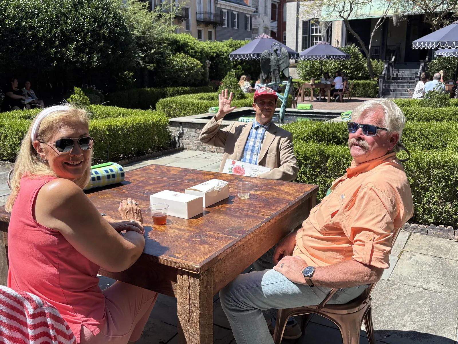 Guests sharing an outdoor gathering with the Get Gumped performer